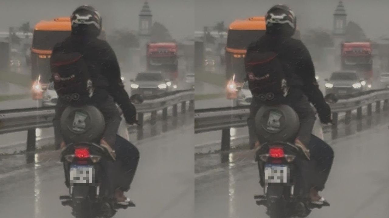 Passageira é flagrada sentada em botijão de gás na garupa de moto na BR-101 em SC